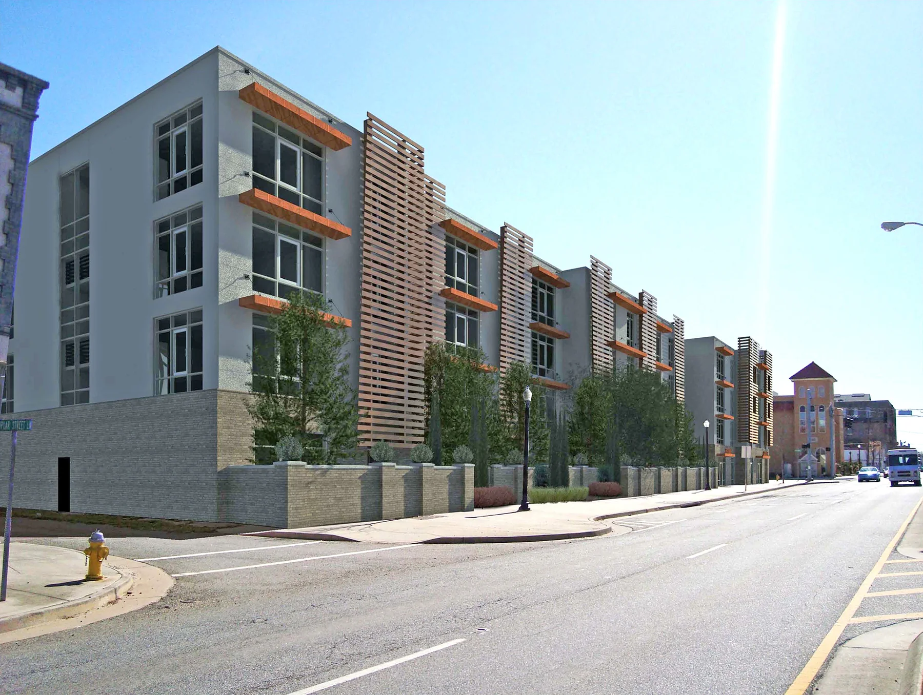 Downtown Macon concept rendering with housing along a city street