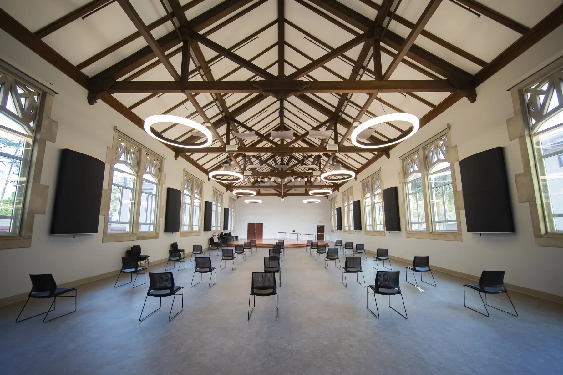 Performance room beneath exposed timber trusses in Powell Hall