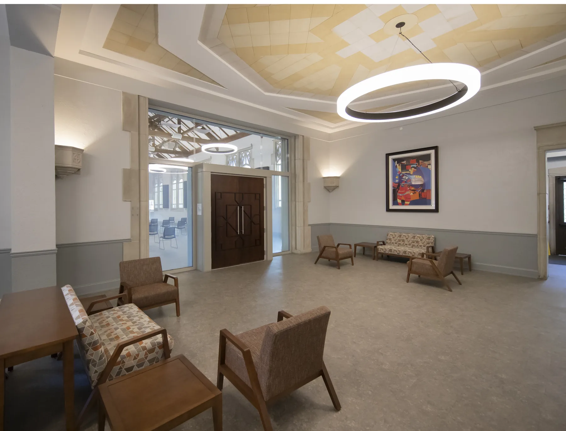 Renewed Powell Hall lobby with circular pendant light